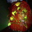 A radioactive pumpkin made with glow sticks and artistically carved by Tom Nardone