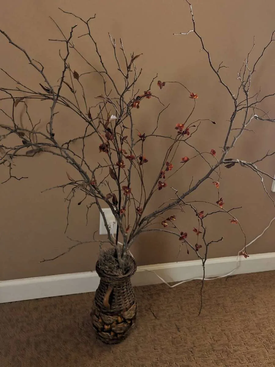 This is the very first fake tree I created to use as home decor in our bonus room. It's been bumped and has a few broken branches... but you get the idea.