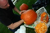 Jim scraping out the pumpkin guts prior to carving.