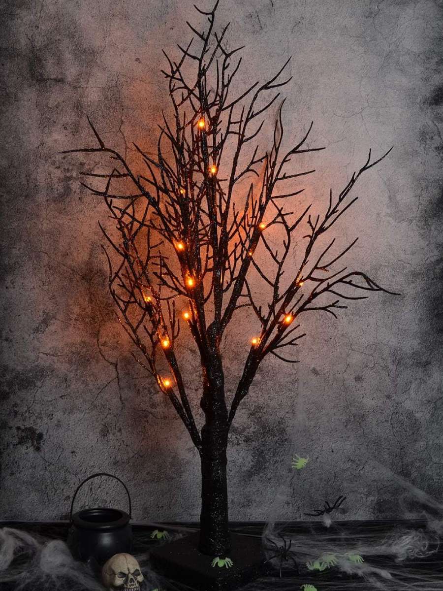 An eerily simple yet creepy looking Halloween tree for indoor decor.