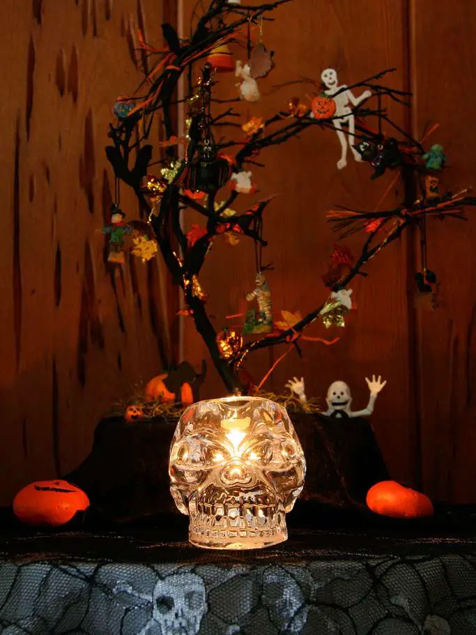 Here's another example of using dead or broken tree branches from your own backyard to make a Halloween tree.