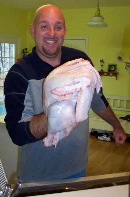 My husband with a handful of turkey!