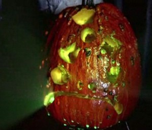 A radioactive pumpkin made with glow sticks and artistically carved by Tom Nardone