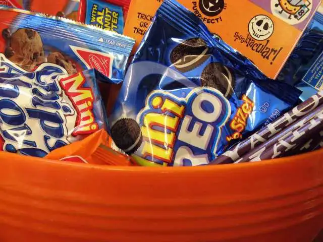 Snack size cookies are always a hit for Halloween. So are Halloween stickers and small toys!