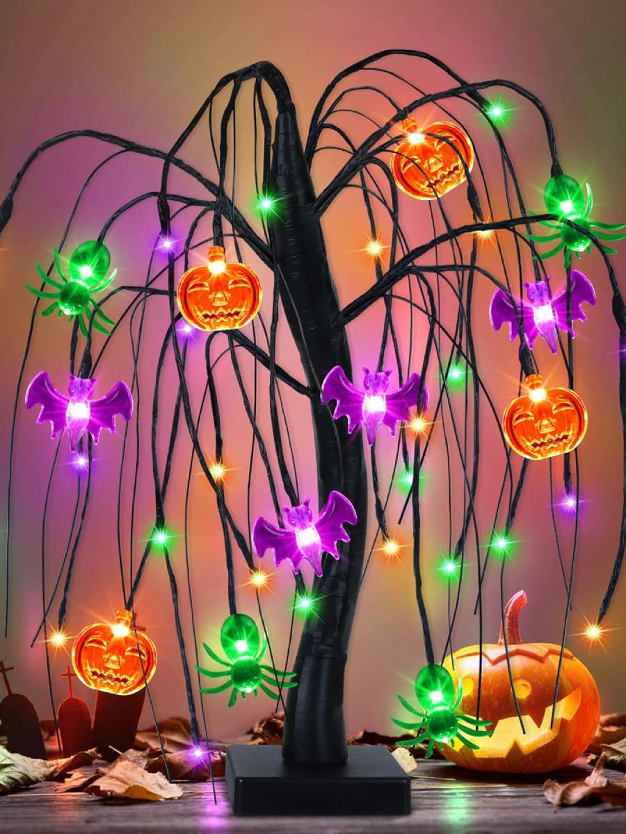A fun Halloween tree with colorful bright lights to set on a tabletop.