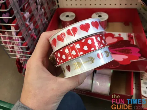 I chose a few different types of Valentine ribbon from the dollar store - to tie the cellophane bags closed.