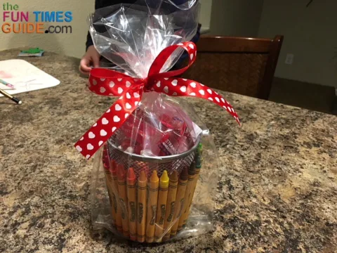 A Valentine ribbon securely holds these DIY gift baskets closed.